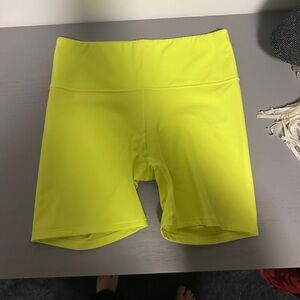 Skims neon yellow bike shorts